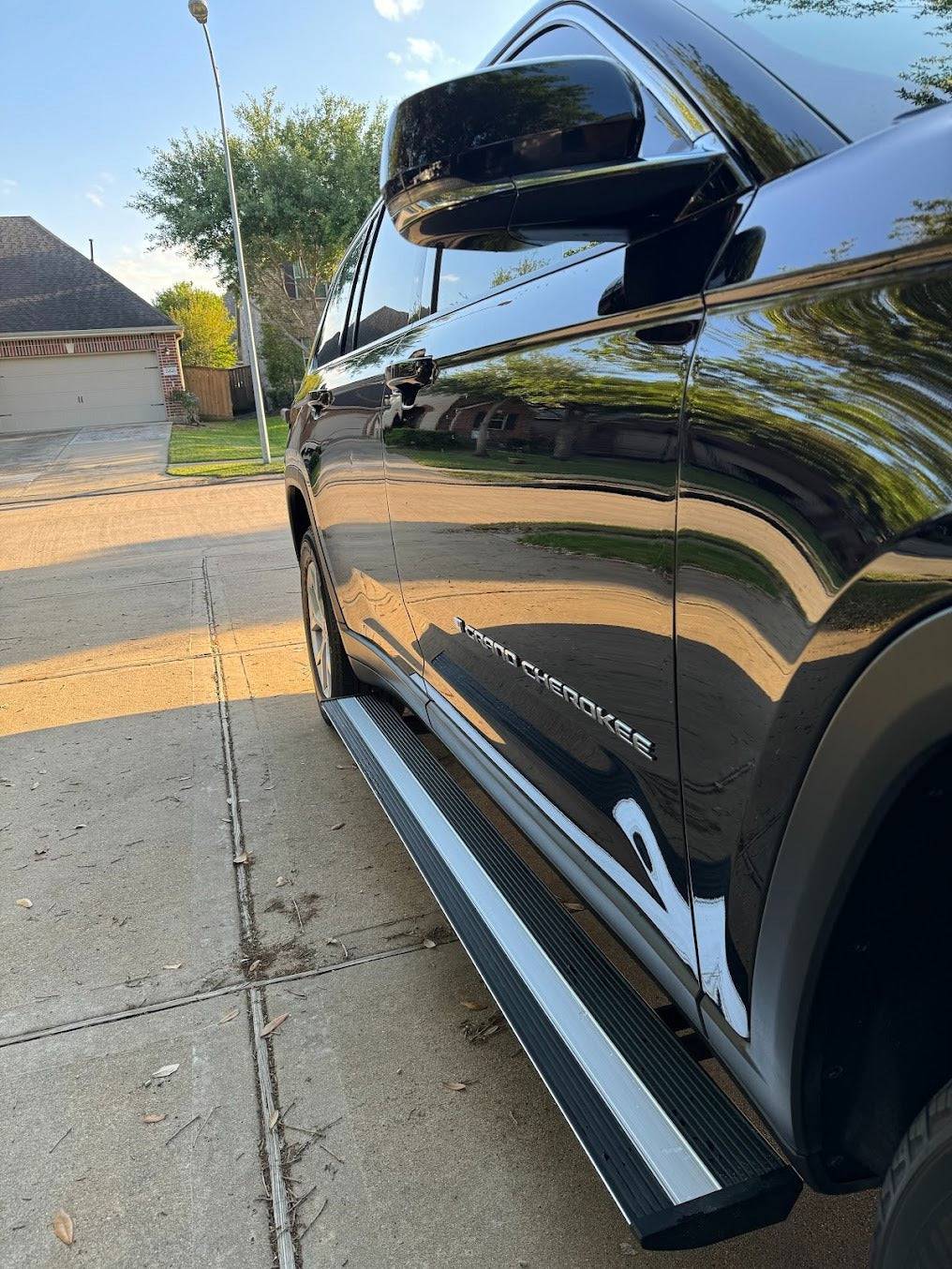 AutoTech Trends Running boards and steps for Jeep Grand Cherokee L 2021-2024 - The best-selling, Sleek and Retractable steps on the market for Luxury SUV’s & XUVs that are durable, reliable, electric, retractable, and lit with LEDs. Introducing the E-LUME Series 1 – the first bolt-on retractable Automatic Running Boards designed specifically for Jeep Grand Cherokee L 2021-2024. Experience the convenience and style with AutoTech Trends today!