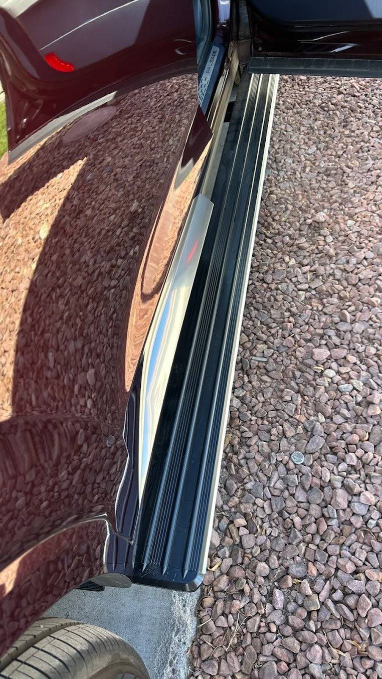 AutoTech Trends Running boards and steps for Hyundai Santa Fe 2019-2023 - The best-selling, Sleek and Retractable steps on the market for Luxury SUV’s & XUVs that are durable, reliable, electric, retractable, and lit with LEDs. Introducing the E-LUME Series 1 – the first bolt-on retractable Automatic Running Boards designed specifically for Hyundai Santa Fe 2019-2023. Experience the convenience and style with AutoTech Trends today!