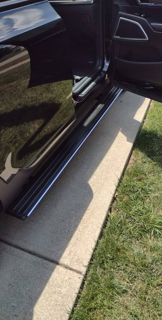 AutoTech Trends Running boards and steps for Jeep Gladiator 2018-2023 - The best-selling, Sleek and Retractable steps on the market for Luxury SUV’s & XUVs that are durable, reliable, electric, retractable, and lit with LEDs. Introducing the E-LUME Series 1 – the first bolt-on retractable Automatic Running Boards designed specifically for Jeep Gladiator 2018-2023. Experience the convenience and style with AutoTech Trends today!