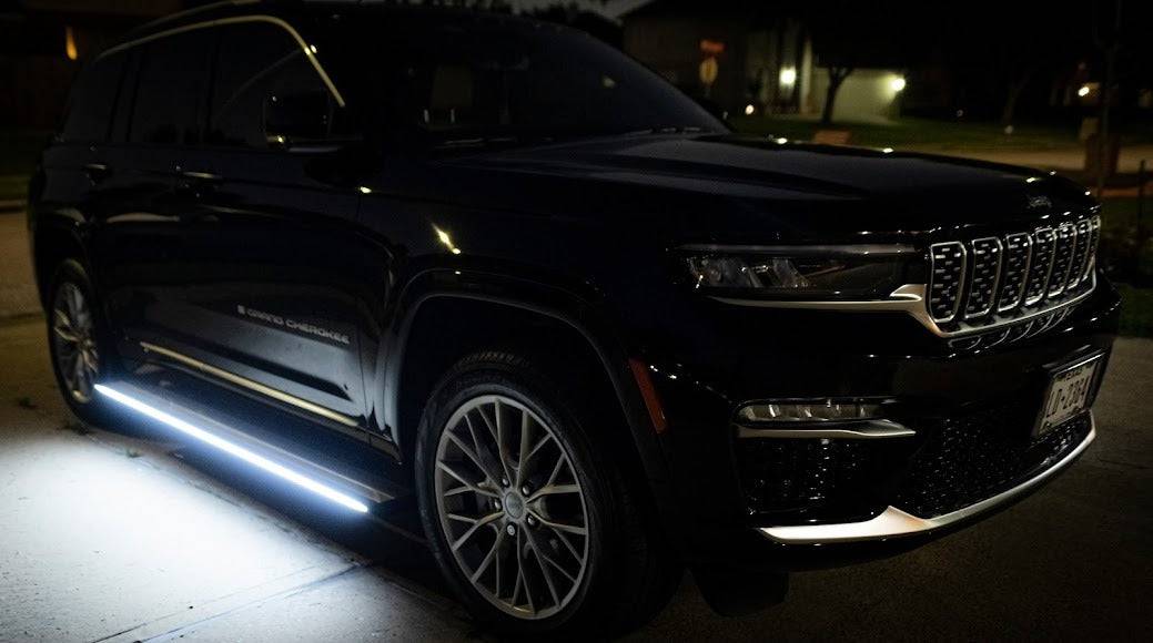 AutoTech Trends Running boards and steps for Jeep Grand Cherokee 5th 2022-2023 - The best-selling, Sleek and Retractable steps on the market for Luxury SUV’s & XUVs that are durable, reliable, electric, retractable, and lit with LEDs. Introducing the E-LUME Series 1 – the first bolt-on retractable Automatic Running Boards designed specifically for Jeep Grand Cherokee 5th 2022-2023. Experience the convenience and style with AutoTech Trends today!